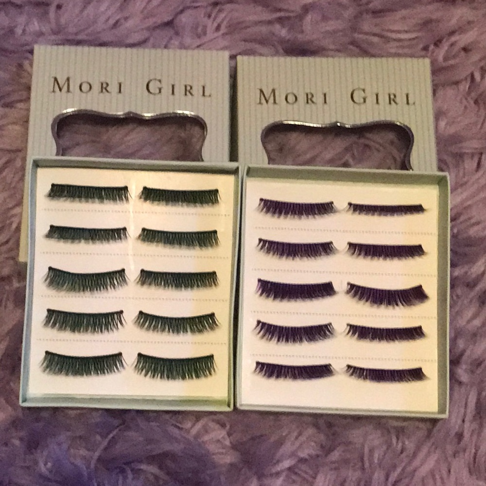 Bundle of purple eyelashes and green eyelashes